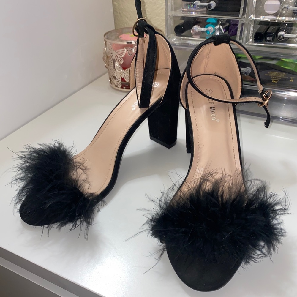 Black furry heels